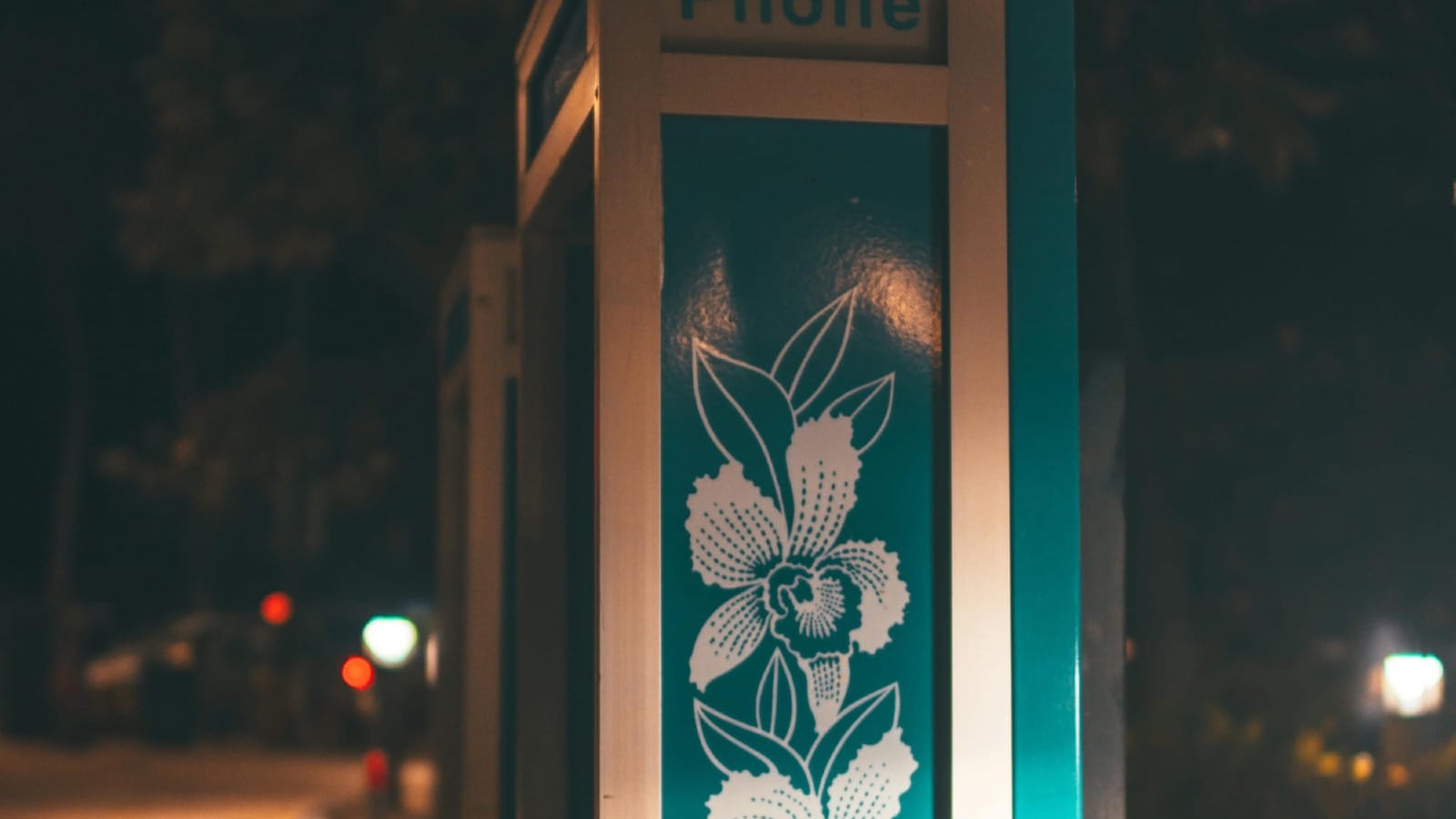 A phone booth in the dark in Hawaii 