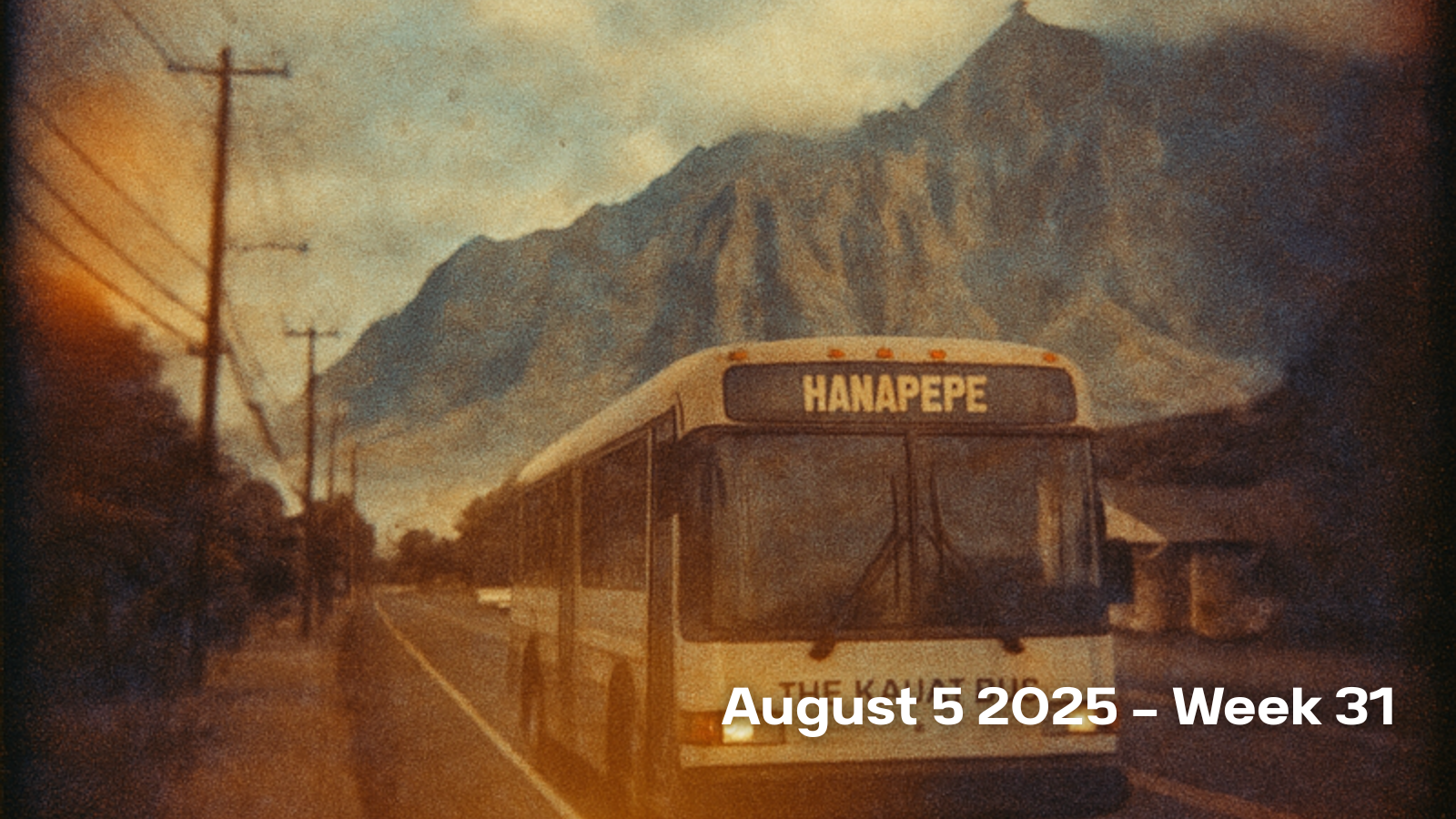 The Kauai Bus with a Hanapepe sign in the front window and double exposure of Nā Pali Coast State Wilderness Park